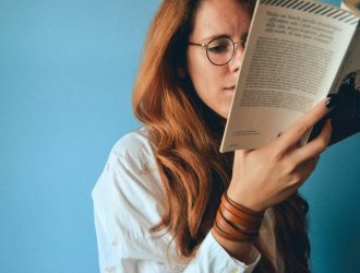 Woman reading a language book