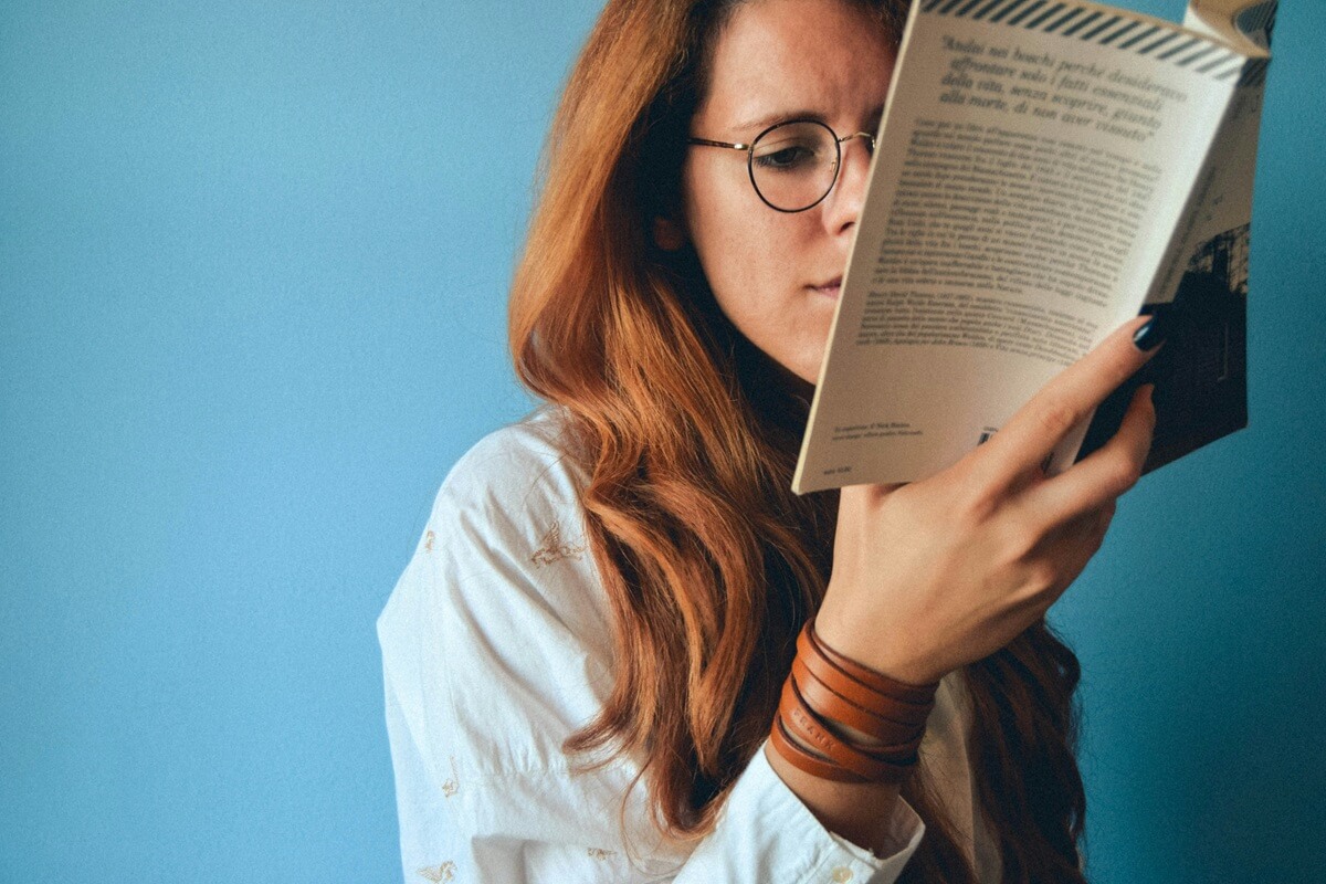 Woman reading a language book