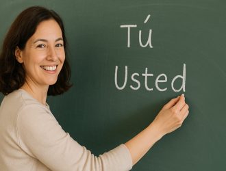 Woman writing Spanish on a blackboard
