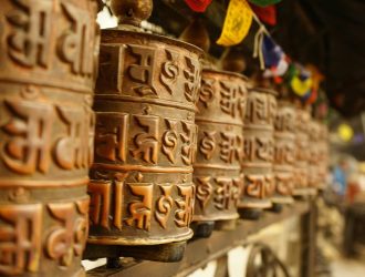 An ancient Buddhist prayer wheel inscribed with characters